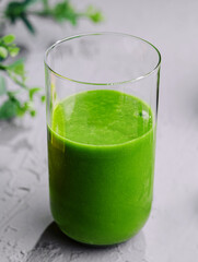 Freshly made spinach smoothie close up