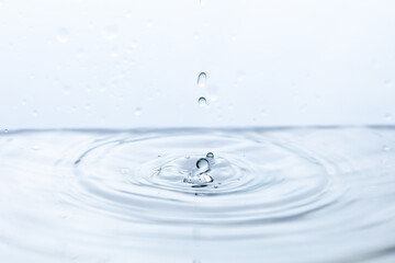 Captivating shot of a pristine water droplet reflecting light, symbolizing purity and clarity....
