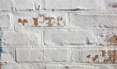 Red white wall background. Old grungy brick wall texture. Vintage wall with obsolete plaster