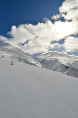 Fototapeta na wymiar Views from Mt. Biei Fuji Hokkaido Japan Snow Landscape blue sky