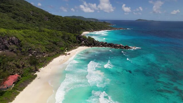 This paradisiacal beach in the Seychelles is also used as a Windows background.