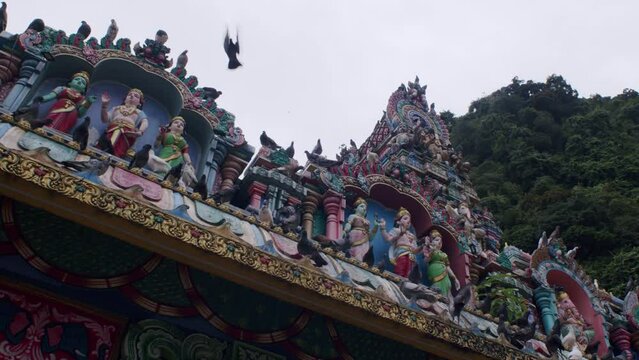 Vibrant Hindu deities adorn Batu Caves temple in Kuala Lumpur