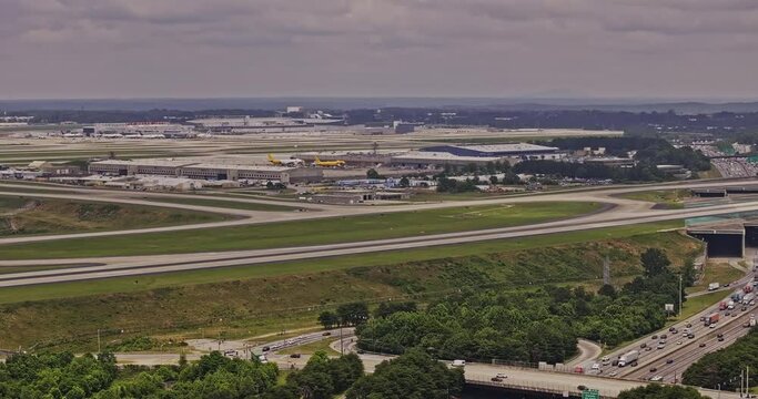 Atlanta Georgia Aerial v942 drone flyover College Park capturing interstate 285 traffic, Hapeville South Cargo and ATL Hartsfield Airport with cityscape skyline - Shot with Mavic 3 Pro Cine - May 2023