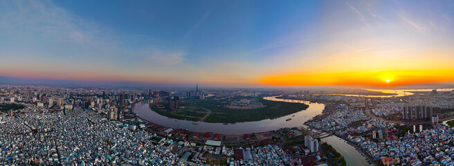 Amazing aerial view panorama Ho Chi Minh city, Vietnam at sunrise, Landmark 81 at island with...