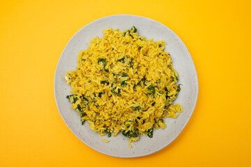 rice with egg and spinach on plate
