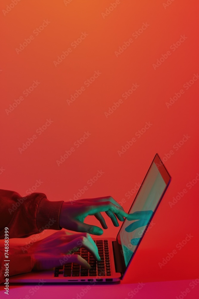 Aufkleber A person using a laptop computer on a table. Suitable for technology concepts