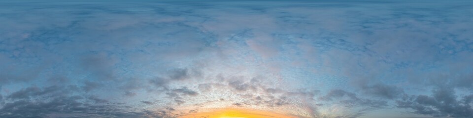 Sunset sky panorama with bright glowing pink Cumulus clouds. HDR 360 seamless spherical panorama....