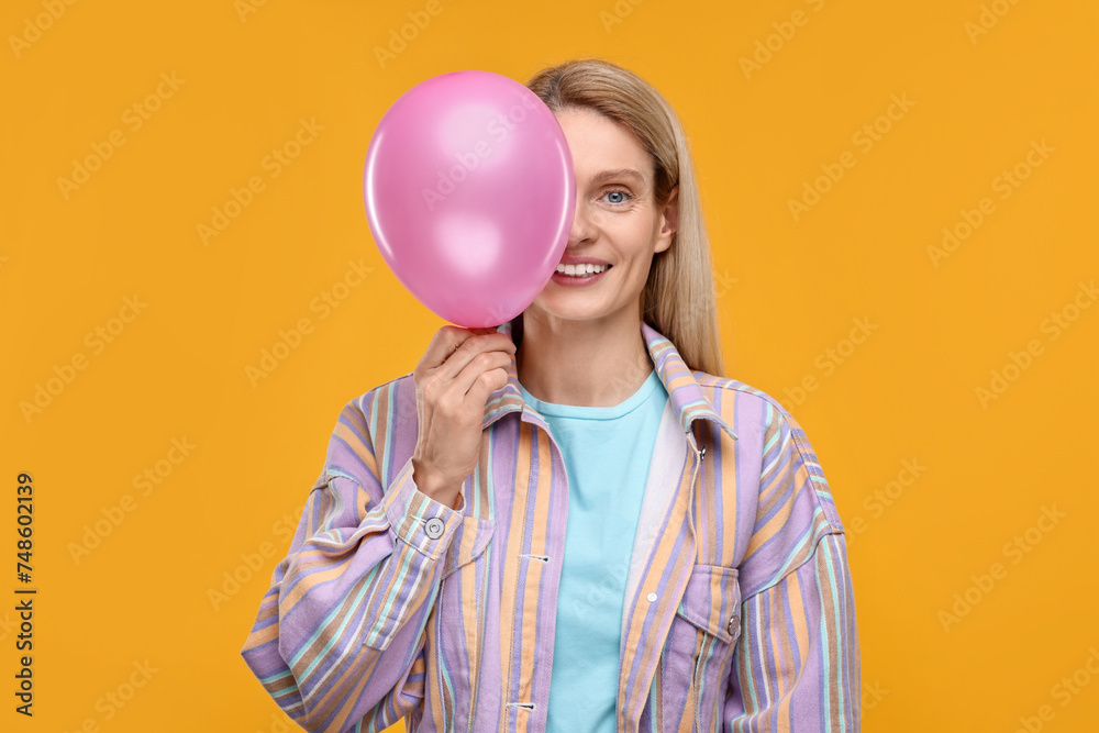 Poster Woman with air balloon on yellow background