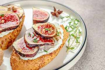Bruschetta with figs, honey and goat cheese. Concept healthy and balanced eating. place for text, top view