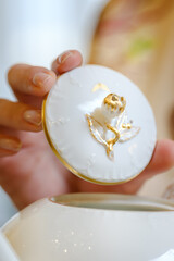 Antique French porcelain set with flowers and gold antiques