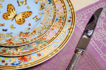 vintage 80 year Old porcelain Dinner set with flowers and butterflies 24 carat Gold