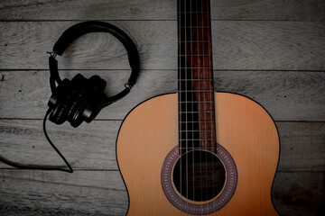 Acoustic guitar and a headphone