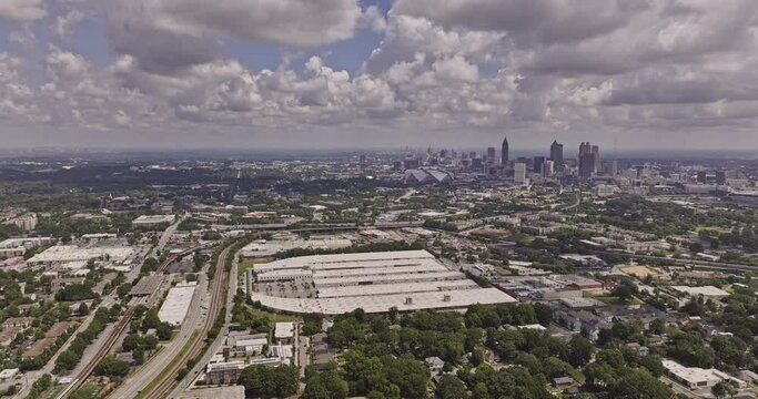 Atlanta Georgia Aerial v982 cinematic drone reverse flyover Adair Park capturing south and downtown cityscape on the skyline with dramatic clouds on the sky - Shot with Mavic 3 Pro Cine - August 2023