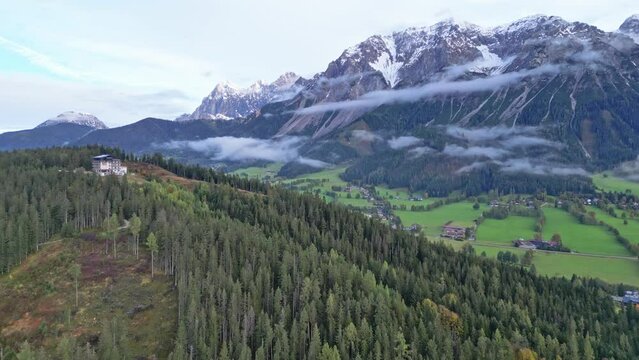 Schladming Austria - White Mountain Peaks and Scenic Natural Landscape - Aerial 4k