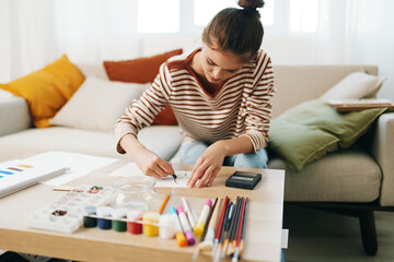 Happy Teenage Girl: Indoor Hobby - Painting and Crafts in Modern Home Studio