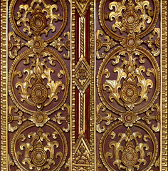 Pattern of flower carved on wood wall background, Thai art style in temple