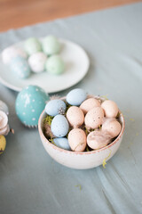 plates with colorful Easter eggs on the table