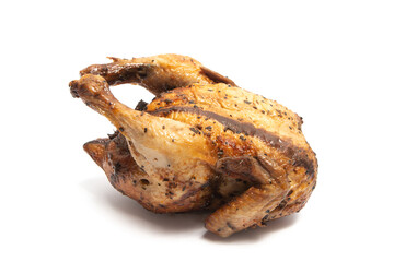 A whole delicious roasted chicken seasoned with herbs isolated on white background clipping path