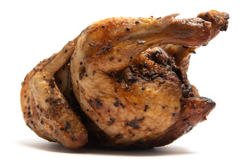 A whole delicious roasted chicken seasoned with herbs isolated on white background clipping path