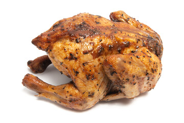 A whole delicious roasted chicken seasoned with herbs isolated on white background clipping path