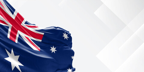 Australia national flag cloth fabric waving on beautiful white Background.