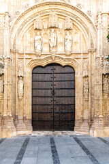 One of the large wooden entrance doors with ornaments of the of Mosque&ndash;Cathedral of Cordoba or Cathedral of Our Lady of the Assumption or Mezquita in Cordoba, Spain