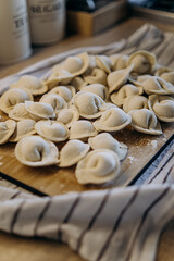 Fototapeta na wymiar homemade dumplings with filling. cooking hobby.preparation of semi-finished products.dough ravioli.National cuisine.aesthetic appearance. meat in dough. Yummy. promotion and advertising. tasty food.