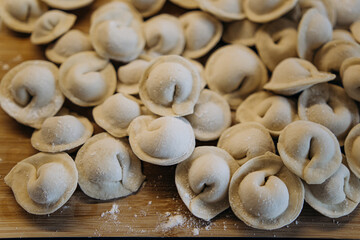 homemade dumplings with filling. cooking hobby.preparation of semi-finished products.dough ravioli.National cuisine.aesthetic appearance.
meat in dough.
Yummy.
promotion and advertising.
tasty food.