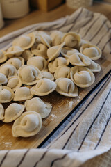 homemade dumplings with filling. cooking hobby.preparation of semi-finished products.dough ravioli.National cuisine.aesthetic appearance.
meat in dough.
Yummy.
promotion and advertising.
tasty food.