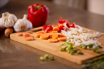 Chopped veggies, cutting board and meal prep for chef, restaurant and bistro for healthy eating....