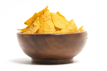 Crispy corn tortilla nachos chips in a wooden bowl isolated on white background clipping path