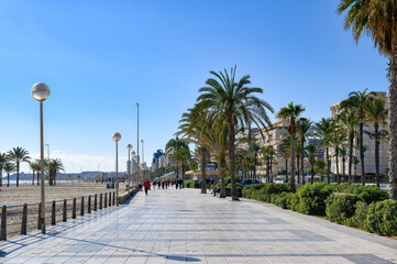 Beach promenade or walkway in San Juan Beach, Alicante, Spain - obrazy, fototapety, plakaty