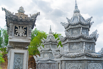 Fototapeta premium Bas-relief patterns of weather towers. Thong Lam Lo Son Pagoda. Vietnam, a suburb of Nha Trang. The country's largest statue of Buddha Amitabha.