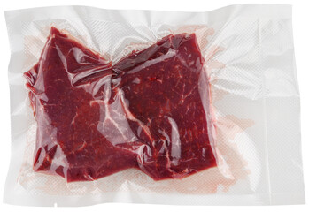 Two pieces fresh raw beef steak in a vacuum bag in a vacuum bag after sealing by a vacuum packer isolated on a white background. Top view. - obrazy, fototapety, plakaty