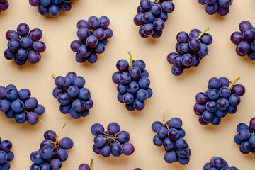 Fresh ripe grapes on a neutral beige background, arranged in a top view flat lay style - obrazy, fototapety, plakaty