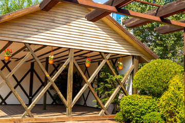 A large gazebo in the summer garden