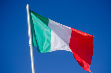 flag of Italy on a blue sky background