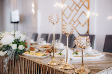 The wedding decor. The white flowers bouquet.