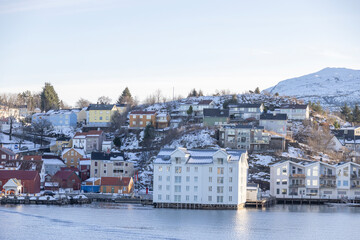 Fototapeta premium Walking along the seaside in Kristiansun town on great winter day 