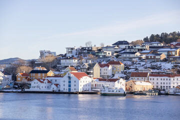 Walking along the seaside in Kristiansun town on great winter day	