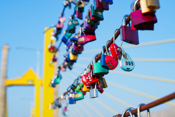 Love locks hanging on parallel bridge to Rama 9 Bridge Chao Phraya River, Thailand's first parallel bridge, Expressway road traffic an important infrastructure in Thailand,