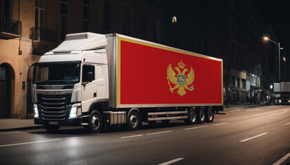 A truck with the national flag of Montenegro depicted carries goods to another country along the highway. Concept of export-import,transportation, national delivery of goods.