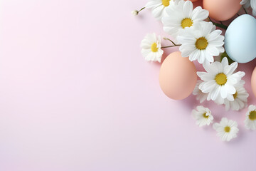Fototapeta na wymiar Pastel colored easter eggs with flowers in corner of pink background with copy space