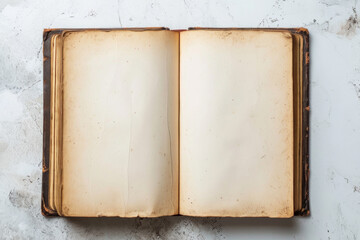 Old opened book with blank pages on white gray marble background. Top view. Mockup template book page with copy space for text