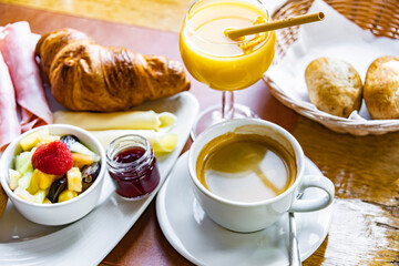 Breakfast served with coffee, orange juice and croissants