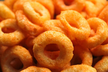  pile of crunchy cheese-flavored ring snacks