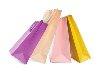 Colorful paper shopping bags isolated on white