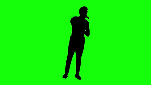 Silhouette man singer. Singing song and dancing on green screen background. Video 4K for compositing and presentation.