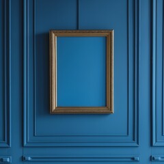 A rectangular blank painting in a gold frame hanging on a blue wall.