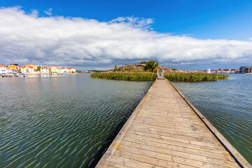 Wooden jetty leading to Stakholmen island in Karlskrona, Sweden. Baltic sea